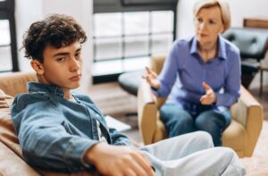 teenage boy during counseling session