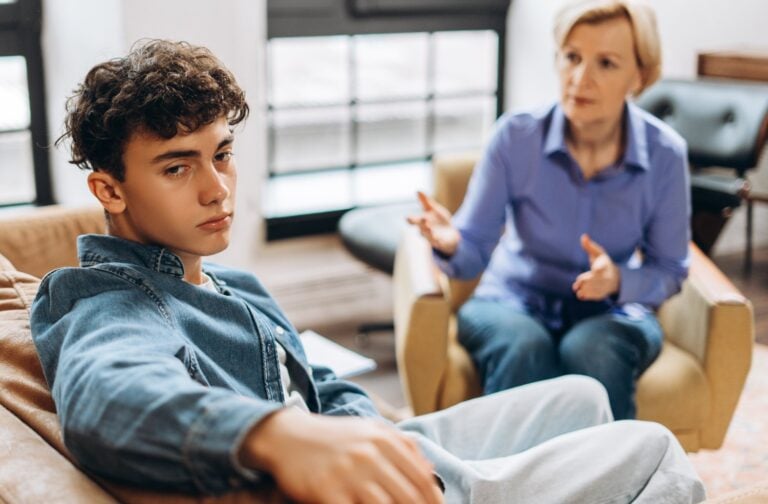 teenage boy during counseling session