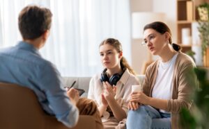 Teen Attends Counselling Session with Family Member